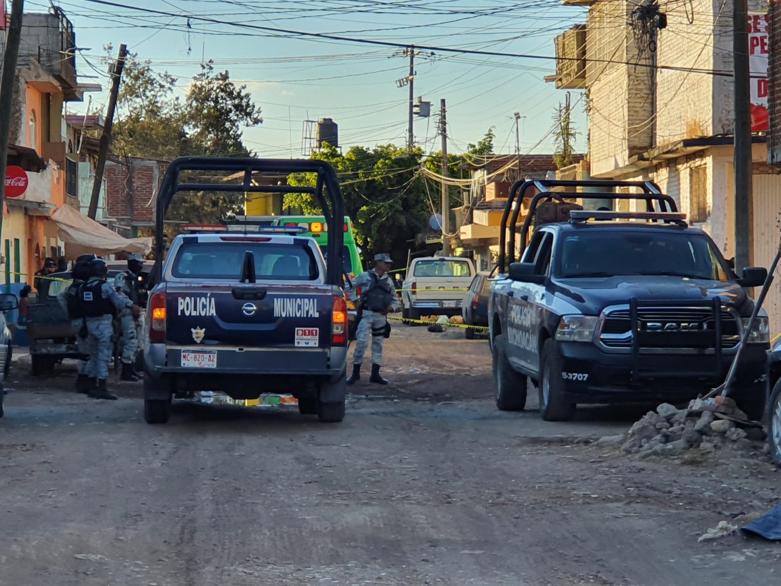 Comerciante ejecutado frente esposa