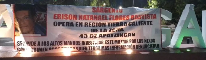 Amanecen mantas para denunciar a mando militar en la región de Apatzingán2