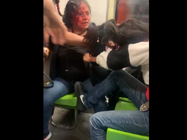 pelea mujeres Metro