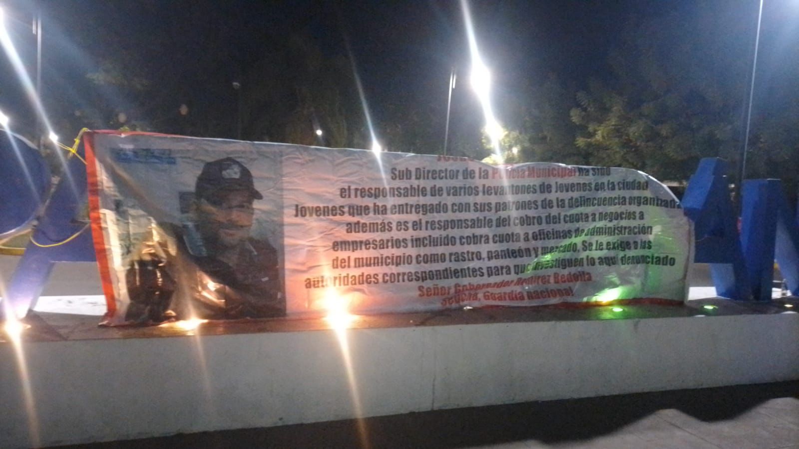Amanecen mantas contra subdirector de policía de Apatzingán