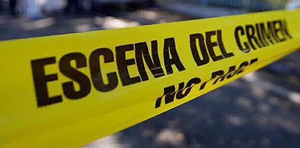 Descubren cuerpo baleado con narcomensaje en Uruapan